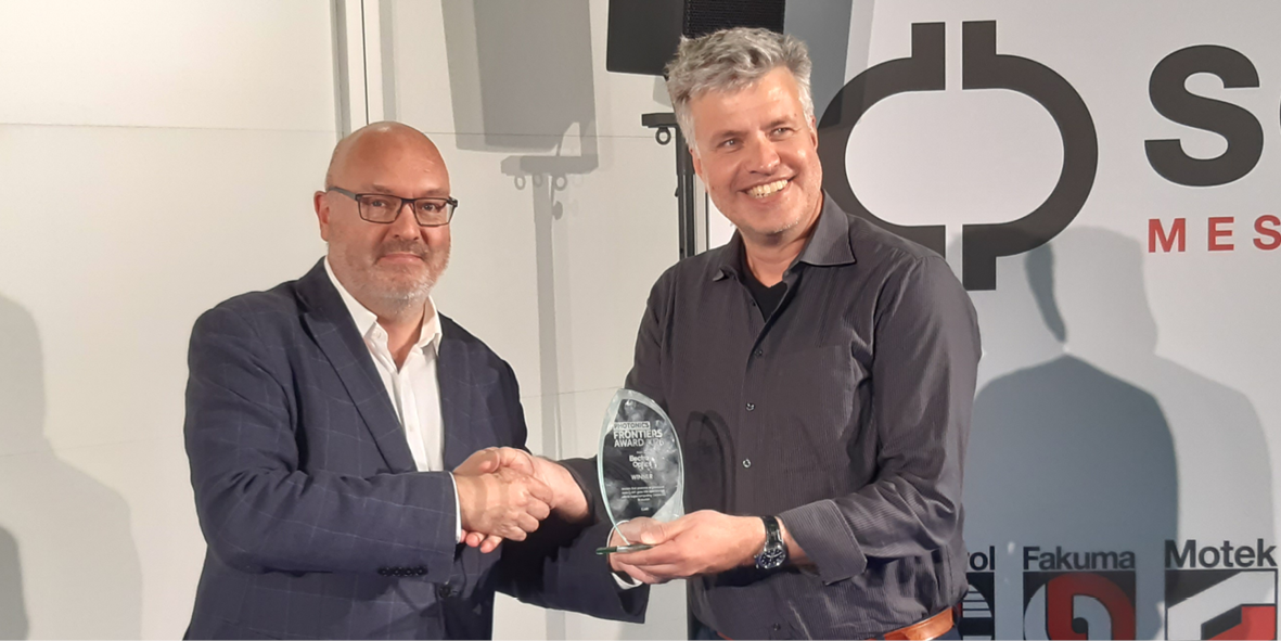 Electro Optics COO, Mark Elliot with Michael Krüger, VP commercials, Q.ANT