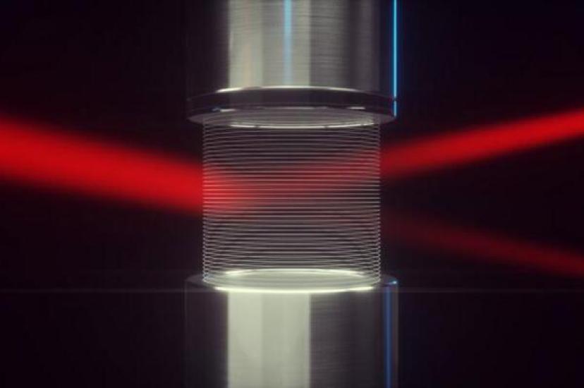 A laser beam passing between a loudspeaker, creating a grafting of air (Image: Science communication lab for Desy)