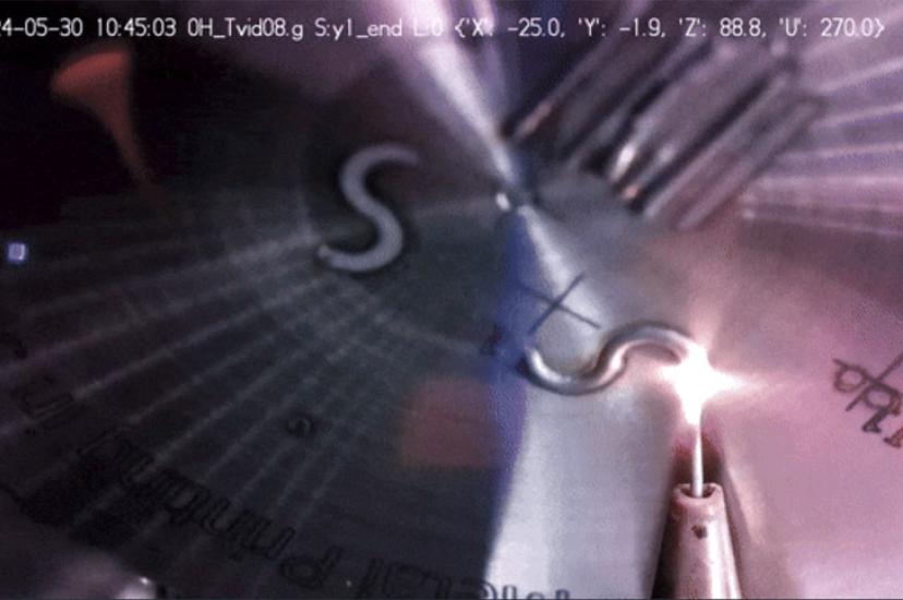 The metal 3D printer feeds stainless-steel wire into the printing area before heating the melt pool with a high-powered laser