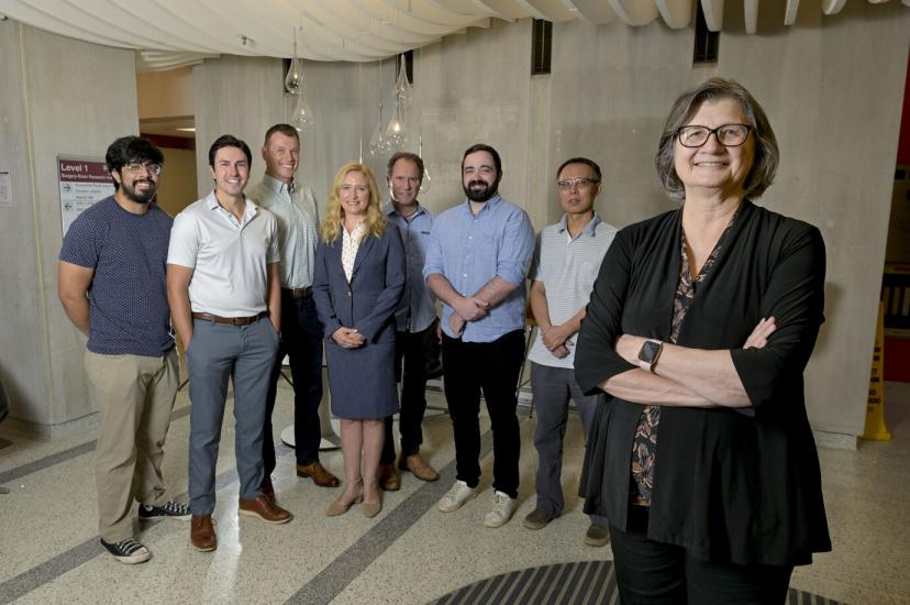 A group of scientists pose for the camera