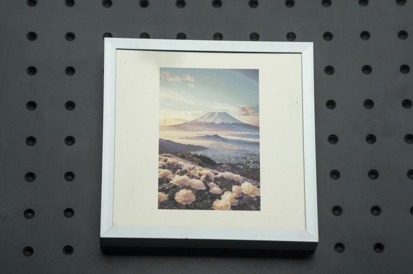 A colour image of Mount Fuji created using laser marking on metal