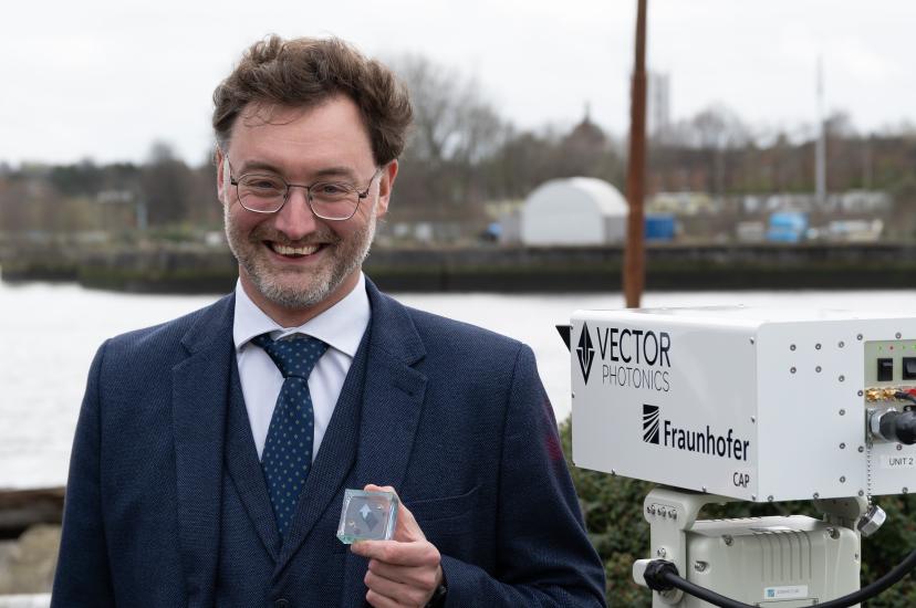 Dr Richard Taylor, CEO and Founder of Vector Photonics, with the PCSEL and optical communications system at the successful demo across the River Clyde.