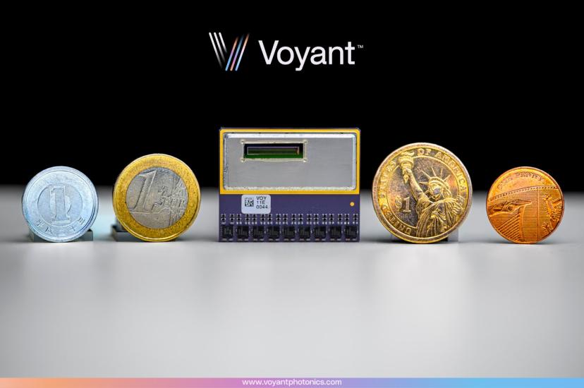 A small integrated circuit next to range of coins and currencies