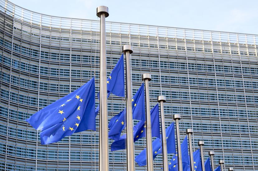 European flags waving in front of Berlaymont Building, the European Commission Headquarters