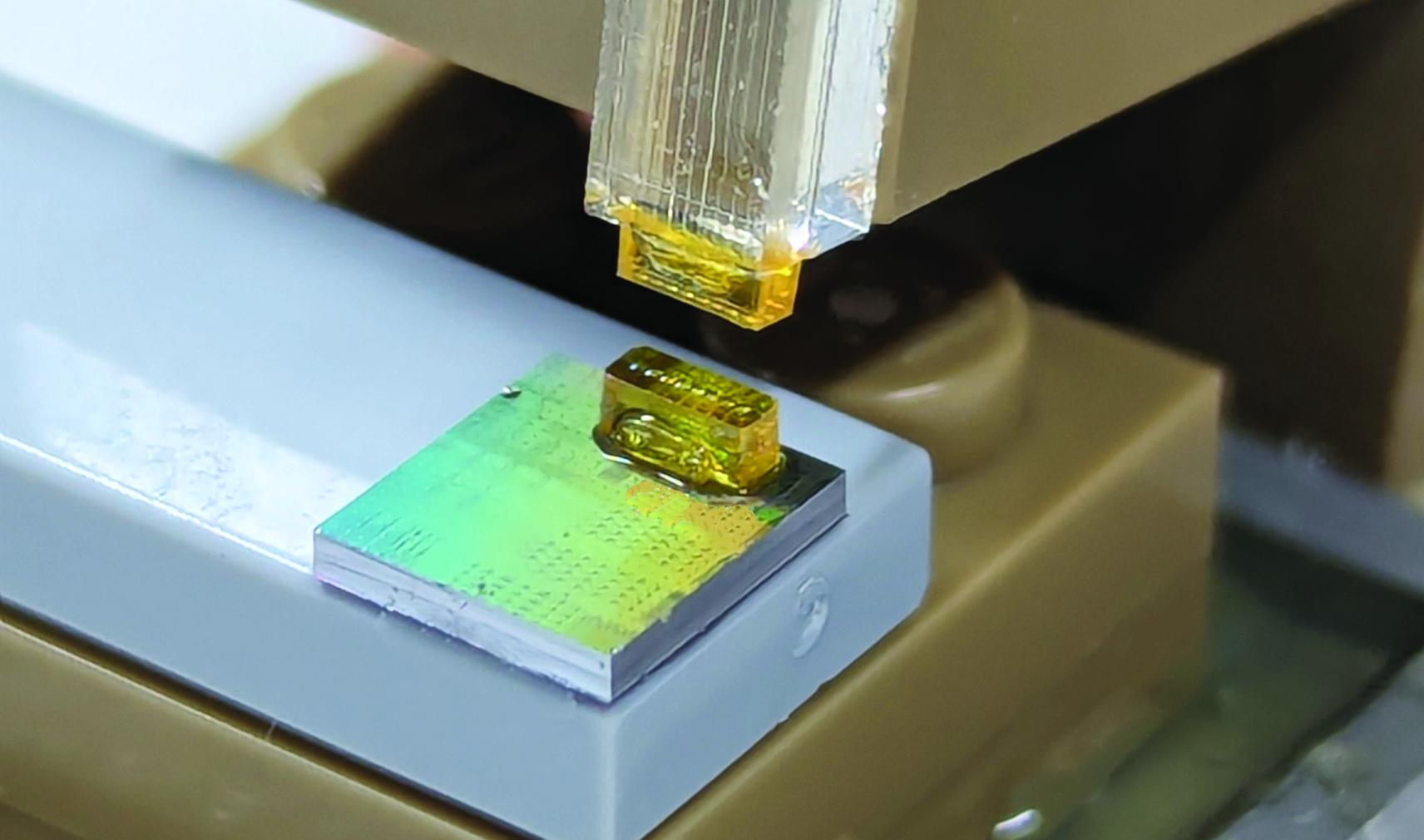 A connector assembly displays SABIC’s EXTEM resin used in a micro-lens array at OFC 2025