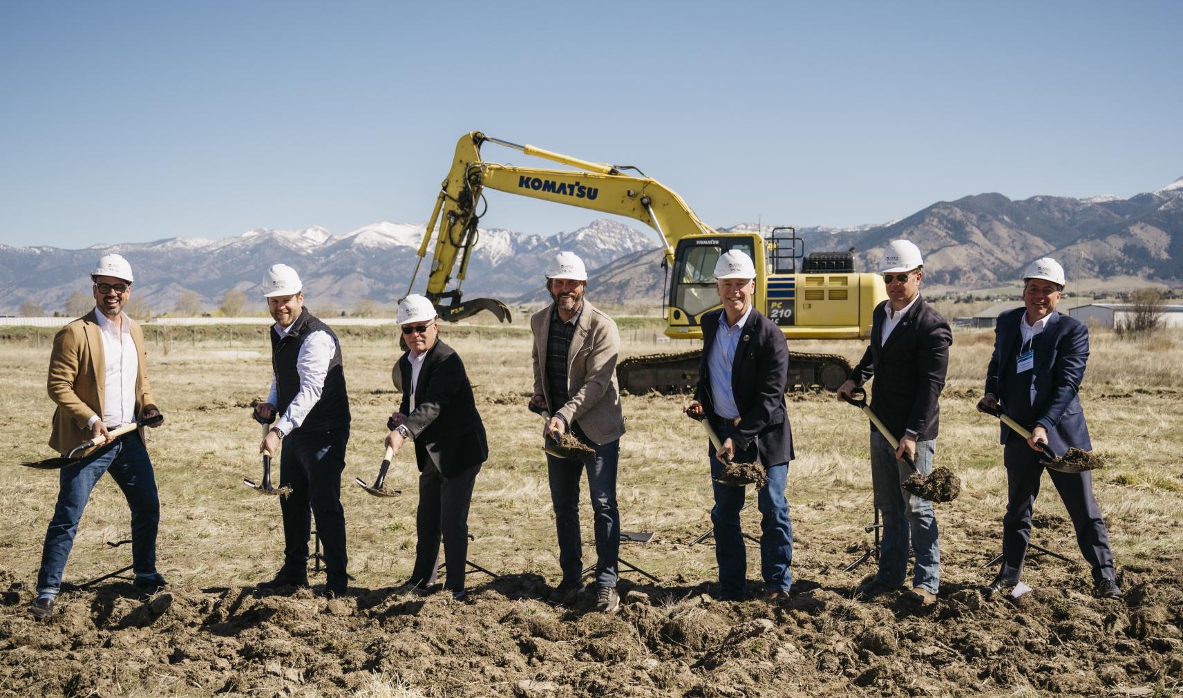Lattice Materials employees break ground at new site in construction area