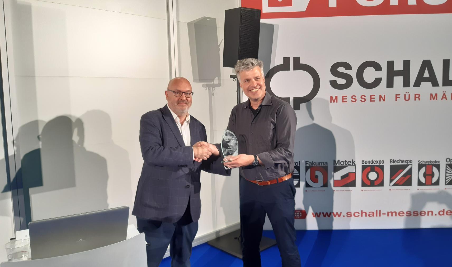 Electro Optics COO, Mark Elliot with Michael Krüger, VP commercials, Q.ANT