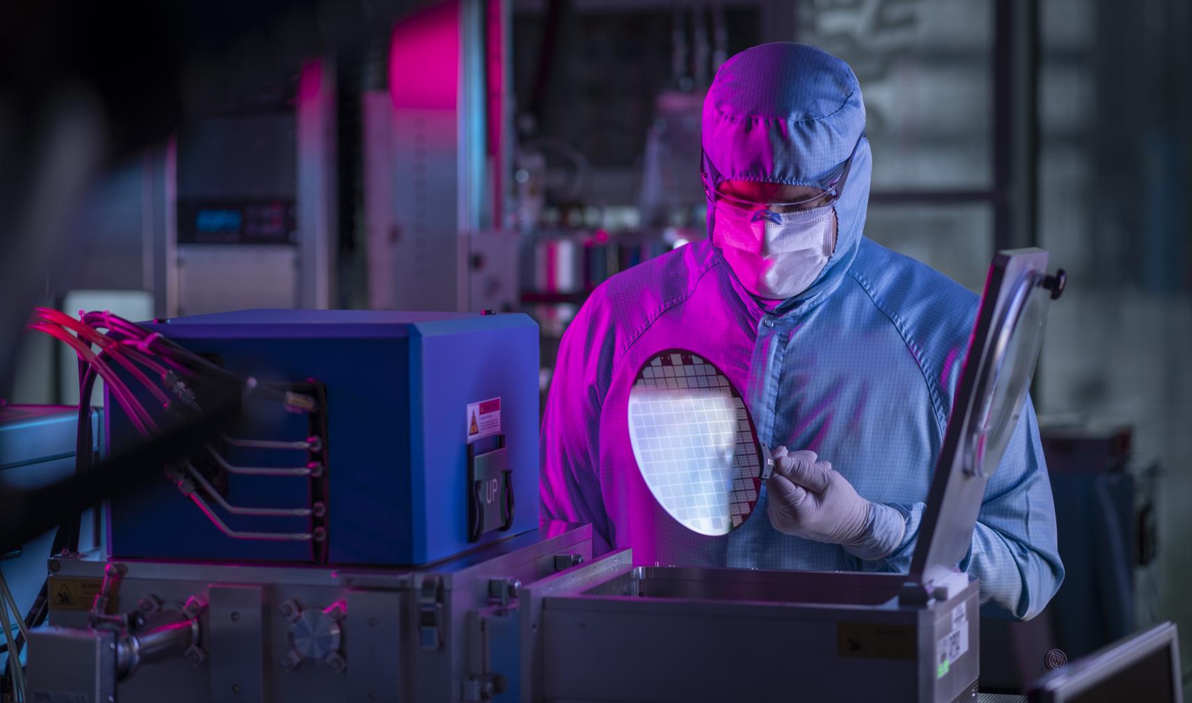 Person in PPE with an MPW in Cornerstone lab