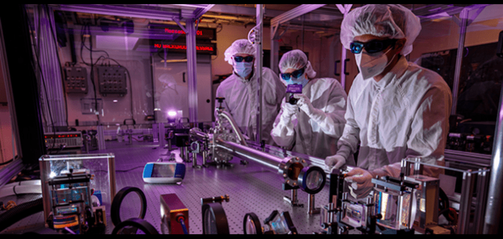 Researchers work on a prototype laser system, developed as part of the project (Image: Lawrence Livermore National Laboratory)
