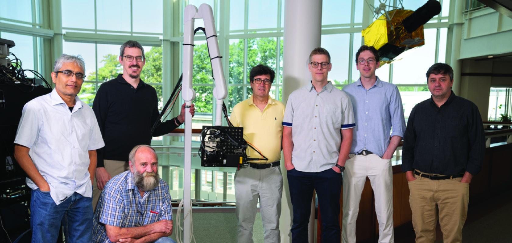 Robert Haupt (fourth from left) with the Lincoln Laboratory researchers