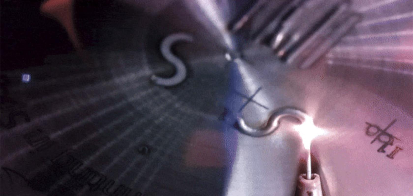 The metal 3D printer feeds stainless-steel wire into the printing area before heating the melt pool with a high-powered laser