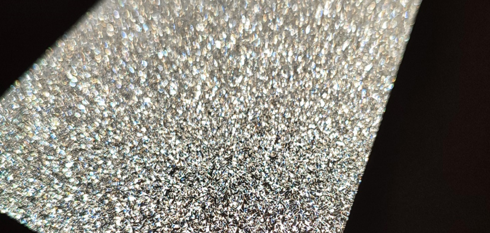 Lighting demonstrator with one-sided 'diamond-like' structure on foil Lighting demonstrator with one-sided 'diamond-like' structure on foil
