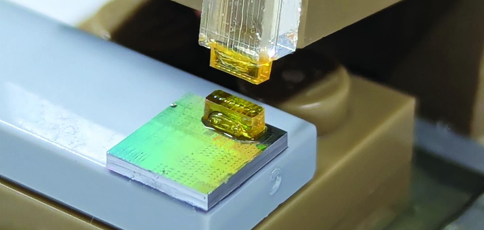 A connector assembly displays SABIC’s EXTEM resin used in a micro-lens array at OFC 2025