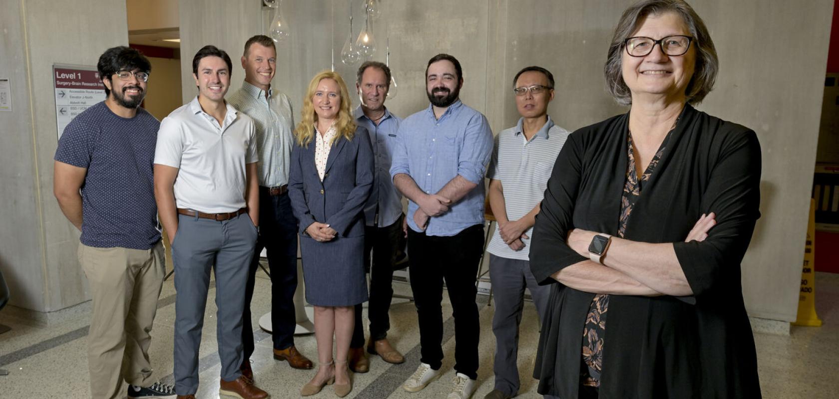 A group of scientists pose for the camera