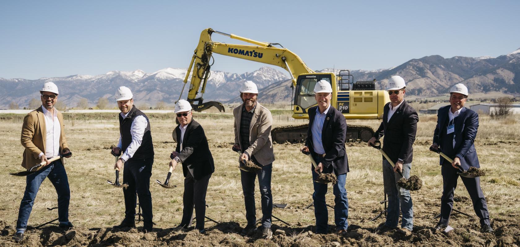 Lattice Materials employees break ground at new site in construction area
