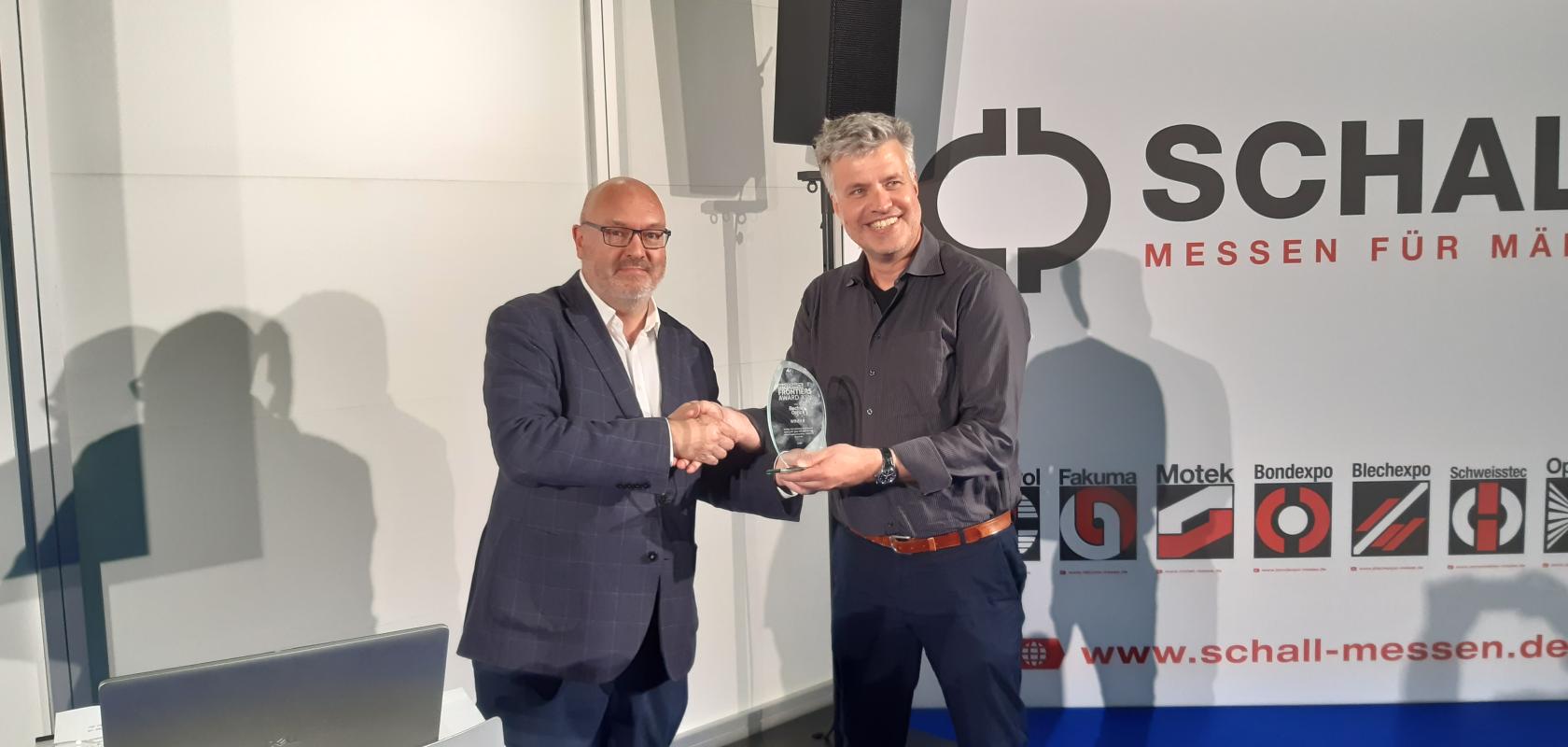 Electro Optics COO, Mark Elliot with Michael Krüger, VP commercials, Q.ANT
