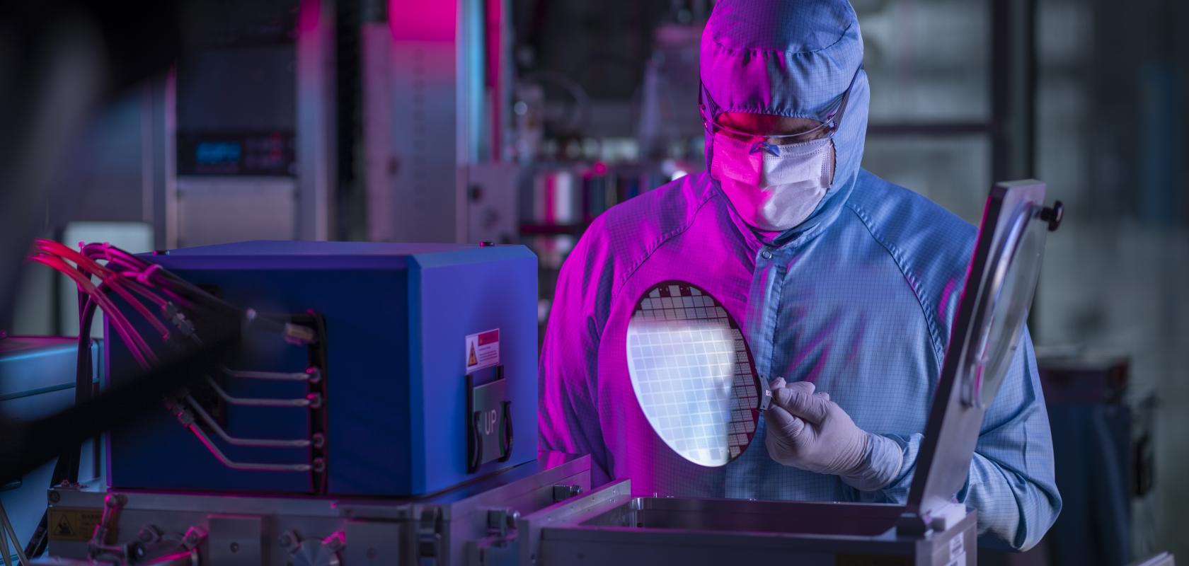 Person in PPE with an MPW in Cornerstone lab