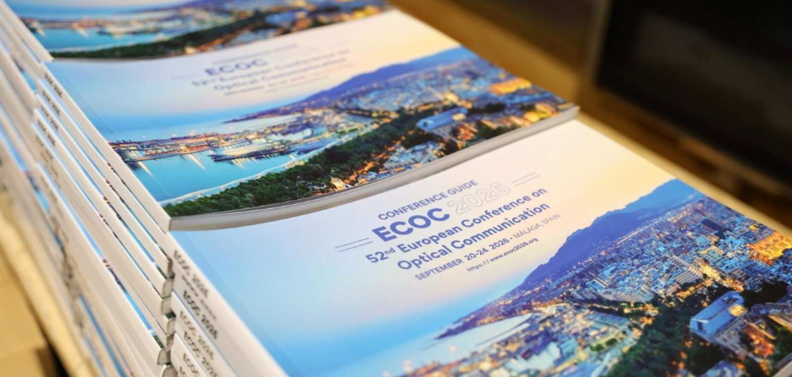 ECOC 2026 brochure in stacks during the event
