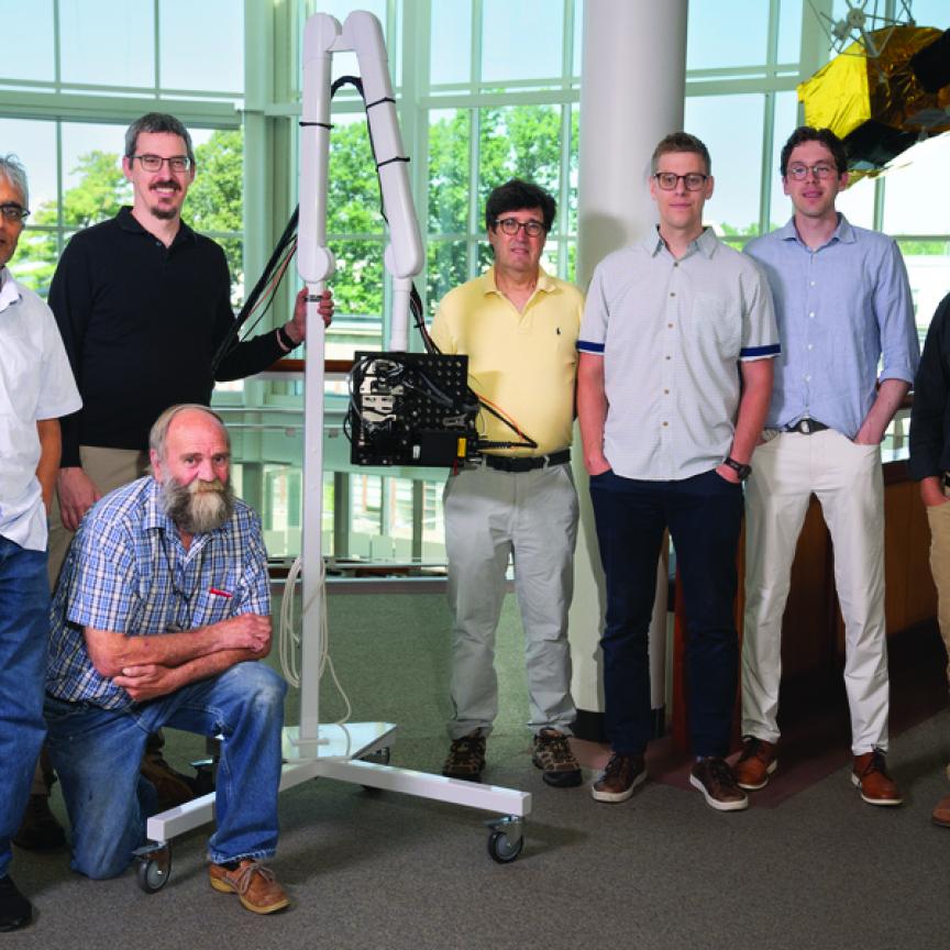 Robert Haupt (fourth from left) with the Lincoln Laboratory researchers