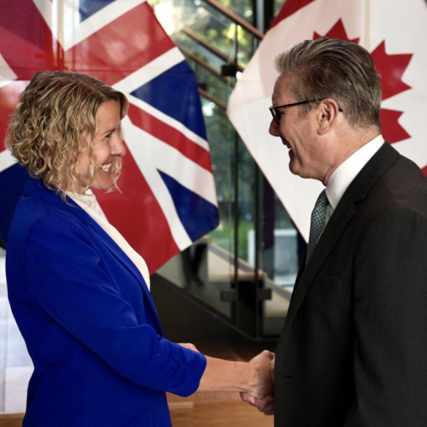 Dr. Stephanie Simmons shakes hands with UK Prime Minister Keir Starmer